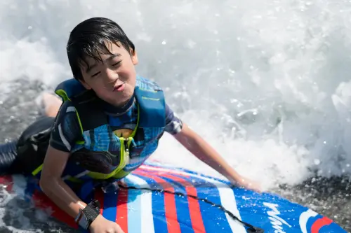 Austin’s first wave. It’s so amazing to see how quickly our little campers fall in love with the ocean.