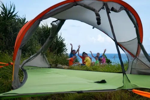 The view from our floating tree tents…  The Pacific Ocean and smiling faces, just the way we like it!