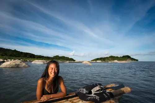 The smile of success. A day spent navigating down rivers on a homemade raft. 