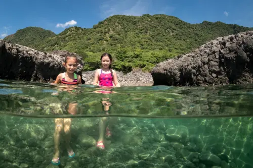 Enjoying a refreshing rock pool on a sunny day.